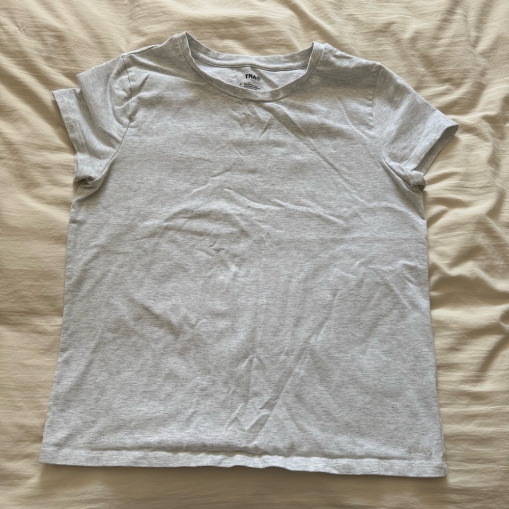 TNA hold it tee